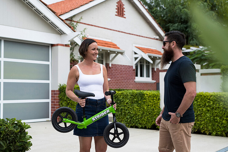 Lady selling a used kids bike
