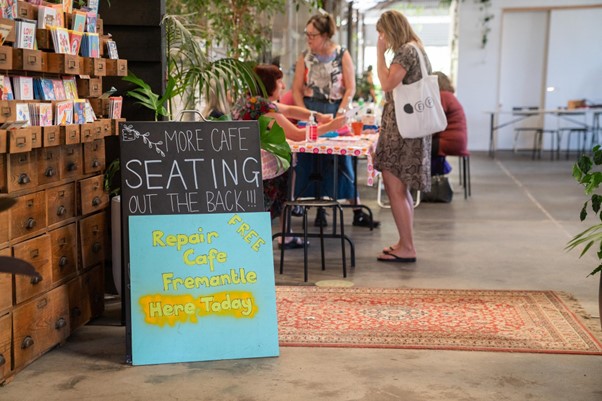 Signage for Repair Cafe Fremantle outside a cafe