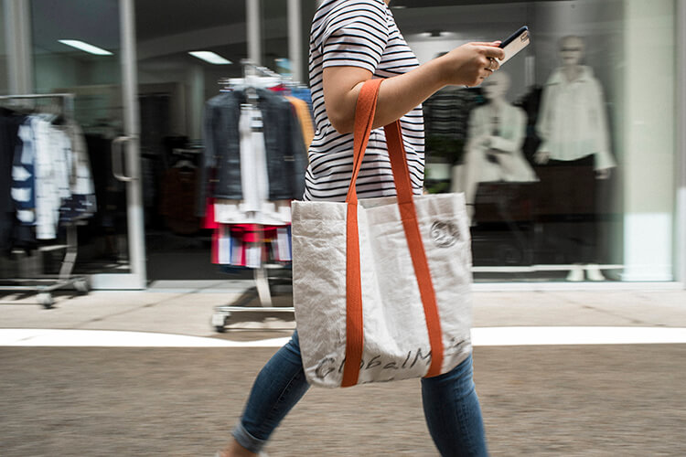 lady carrying a cloth tote