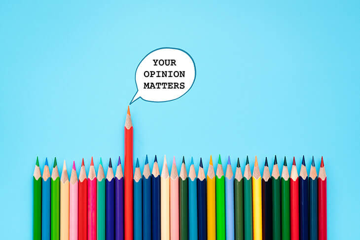colourful pencils with a speech bubble graphic saying 'your opinion matters'