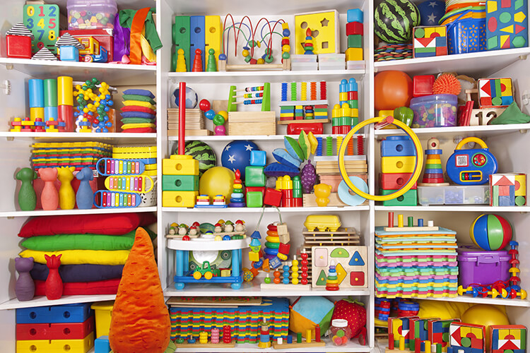 Wall-to-wall shelf filled with colourful toys