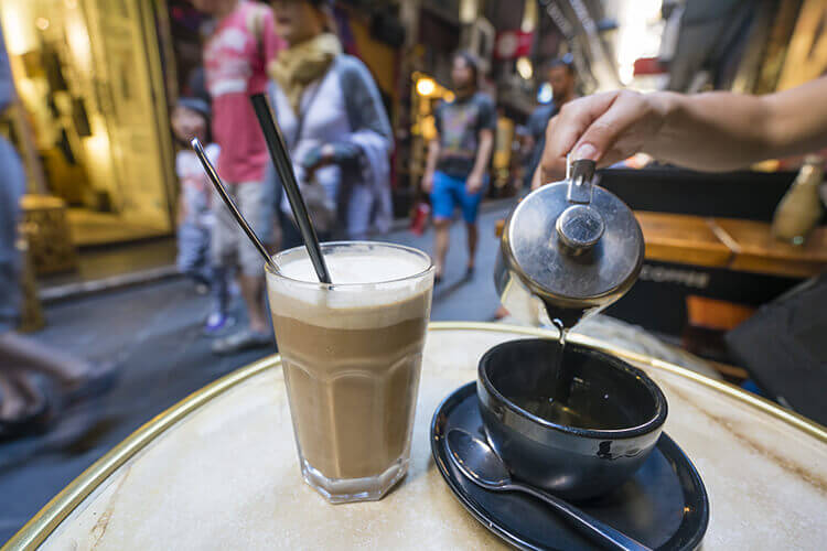 cafe setting with tea being poured